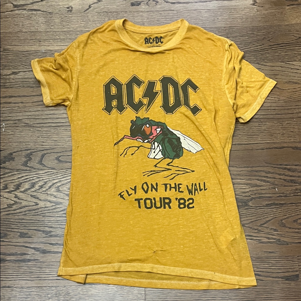 Lucky Brand AcDc Mustard Yellow Fly On The Wall Tour 82 Tee Lucky Brand AcDc Mustard Yellow Fly On The Wall Tour 82 Tee